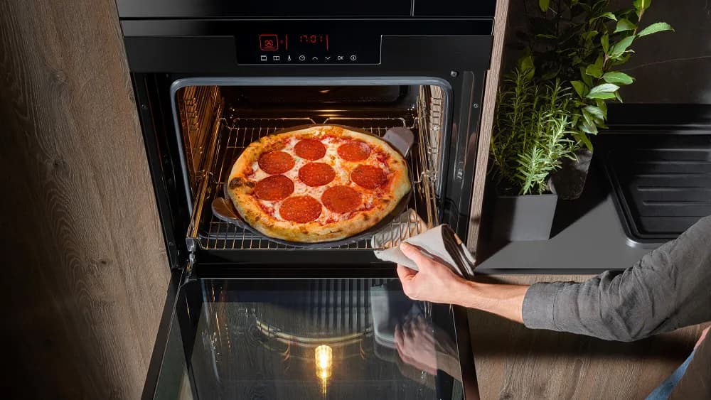 W jakiej temperaturze piec pizzę w piekarniku elektrycznym, aby była idealna?